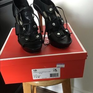 Coach Black Strappy Heels with a platform front